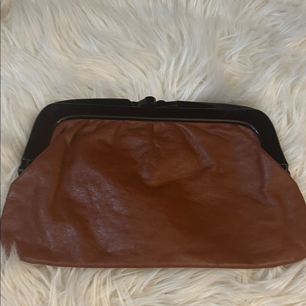 Vintage 100% leather clutch Mantessa